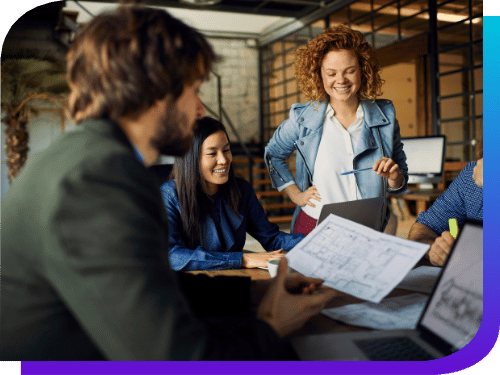 colleagues smiling during a meeting